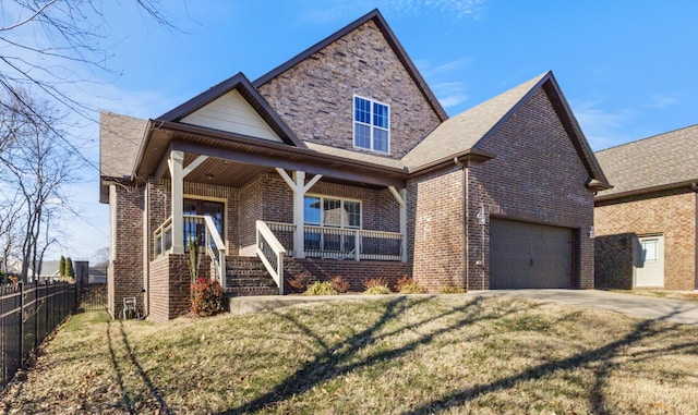 view of front of property with a porch and a front lawn