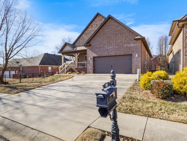 view of front facade with a garage and a porch