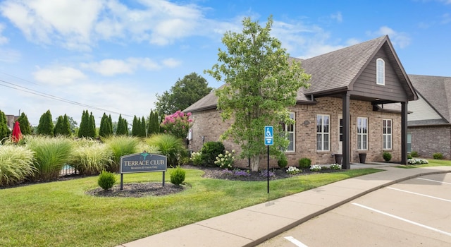 exterior space featuring a front yard