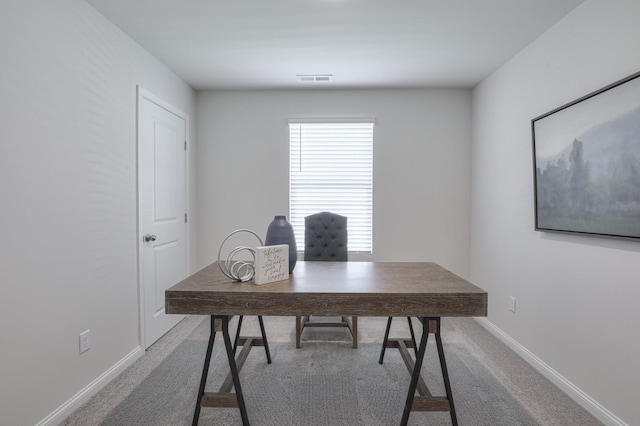 view of carpeted home office