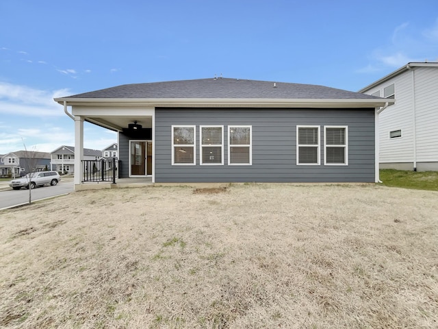 back of house featuring covered porch