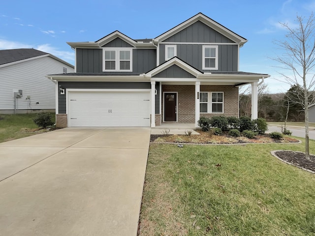 view of front facade with a garage and a front lawn