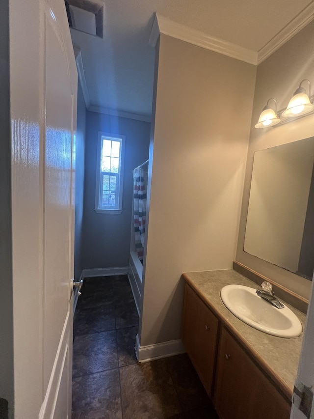 bathroom featuring a shower with curtain, vanity, and crown molding