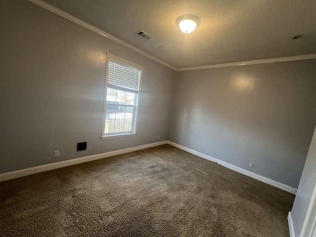 empty room featuring carpet flooring, crown molding, and a textured ceiling