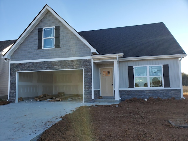 craftsman inspired home featuring a garage