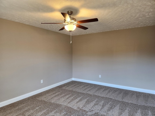 empty room featuring carpet flooring, ceiling fan, and a textured ceiling