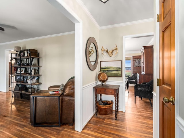 interior space featuring ornamental molding and dark wood-type flooring