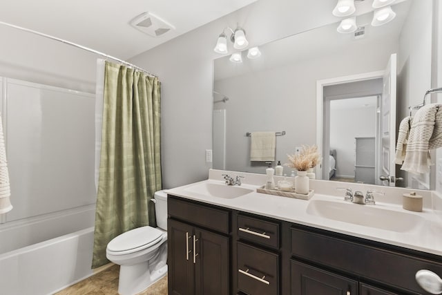 full bathroom with tile patterned flooring, vanity, shower / bath combination with curtain, and toilet