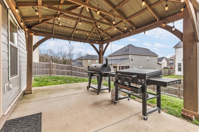 view of patio featuring a gazebo and grilling area