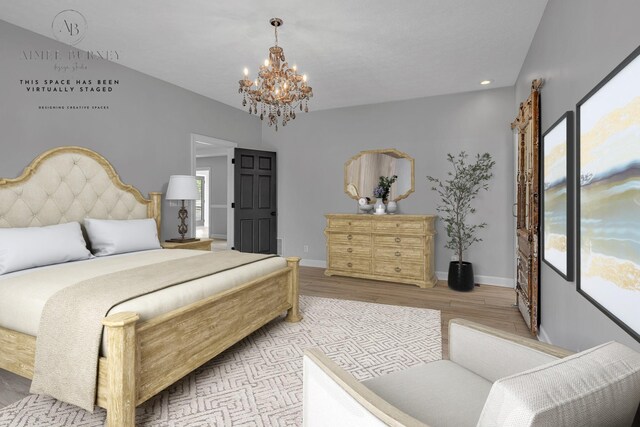 bedroom featuring a chandelier and light wood-type flooring