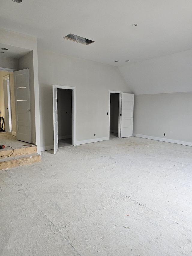 interior space featuring lofted ceiling