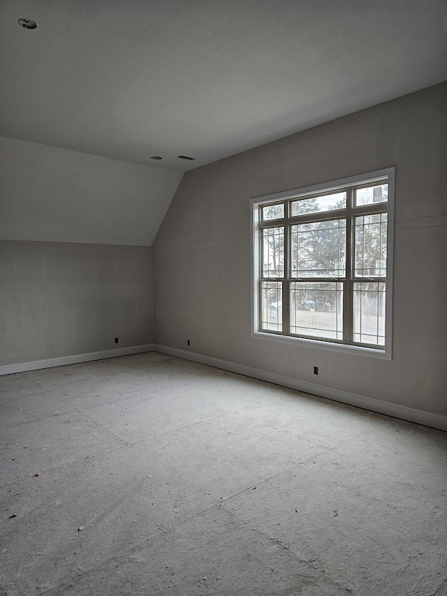 additional living space with lofted ceiling