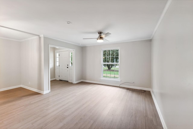 unfurnished room featuring ceiling fan, light hardwood / wood-style floors, and ornamental molding