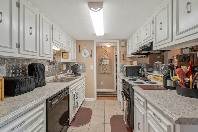 kitchen with black appliances, white cabinets, sink, light tile patterned floors, and light stone counters