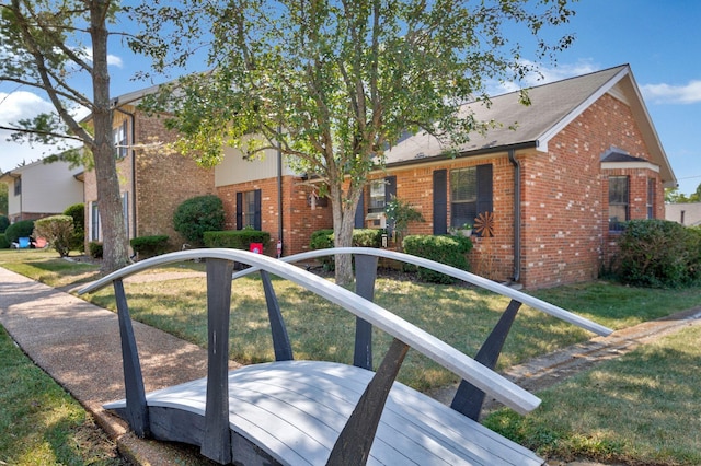 view of front of home with a front yard