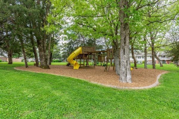 view of jungle gym with a yard