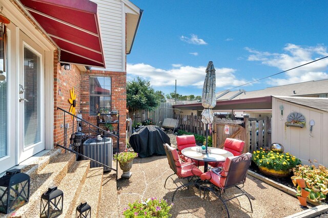 view of patio / terrace with central AC