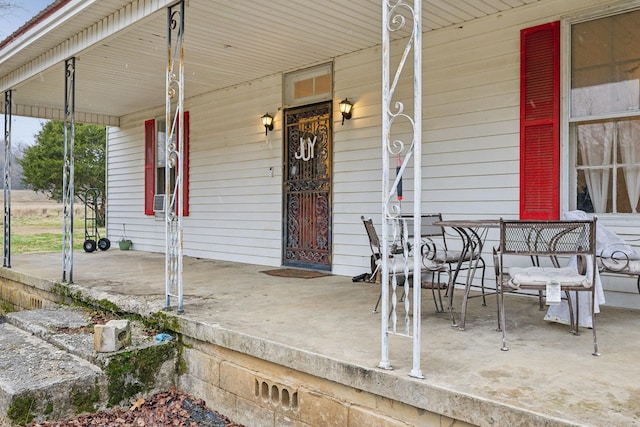 entrance to property with covered porch