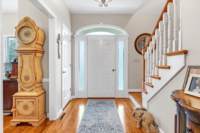 foyer entrance featuring light hardwood / wood-style flooring