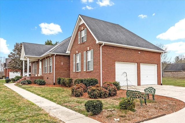 view of home's exterior with a yard and a garage