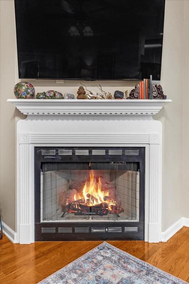 details featuring hardwood / wood-style flooring