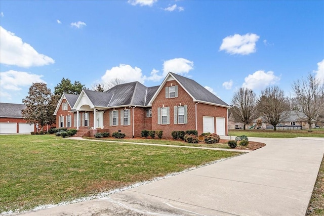 front facade with a garage and a front lawn