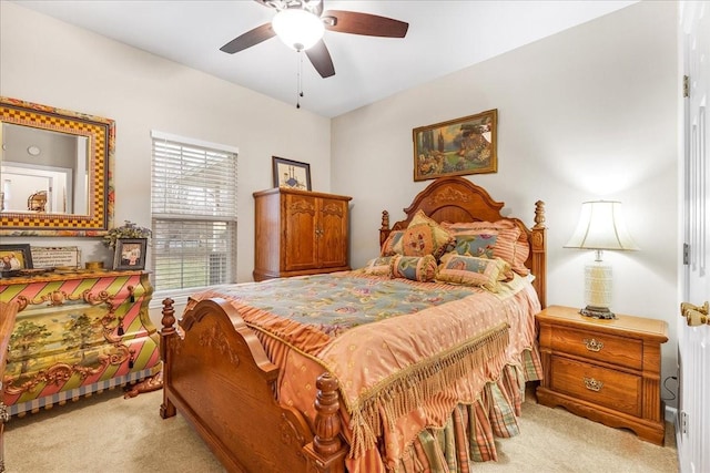 bedroom featuring ceiling fan and light colored carpet