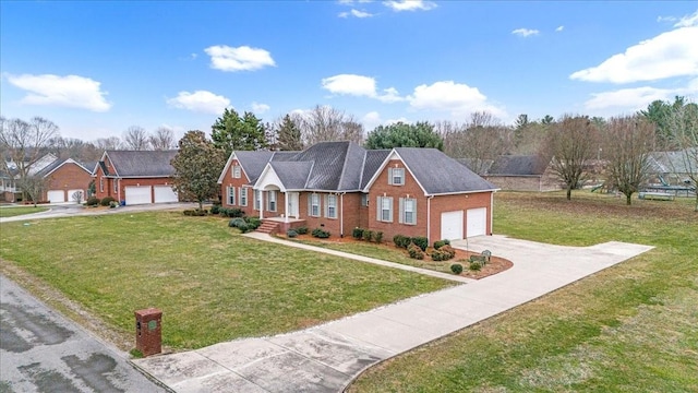 view of front facade with a front yard and a garage