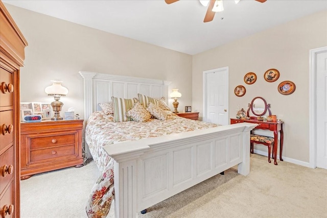 bedroom featuring ceiling fan and light colored carpet