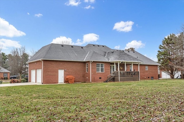 back of house featuring a lawn and covered porch