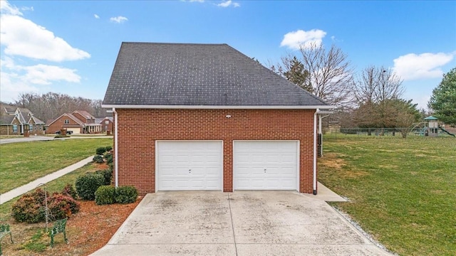 garage with a lawn