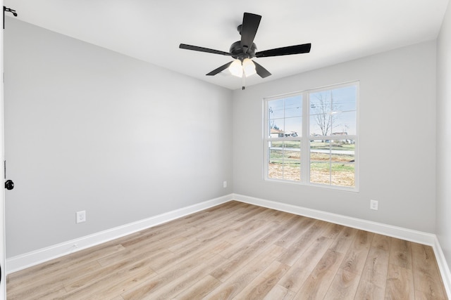 unfurnished room with light hardwood / wood-style flooring and ceiling fan