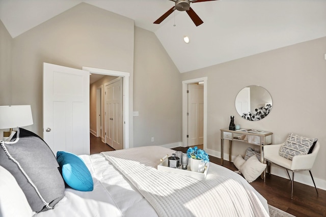 bedroom with ceiling fan, dark hardwood / wood-style floors, and lofted ceiling