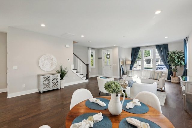 dining space featuring dark hardwood / wood-style flooring