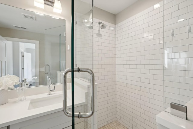 bathroom featuring vanity and walk in shower