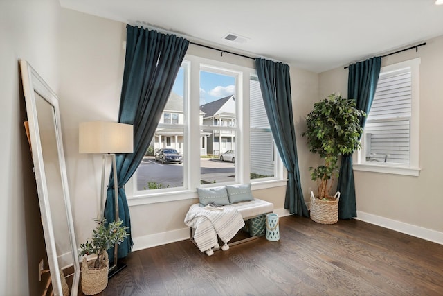 living area featuring dark hardwood / wood-style flooring