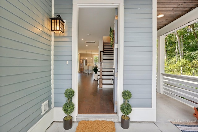 doorway to property with a porch