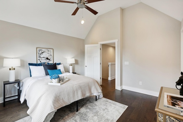 bedroom featuring dark hardwood / wood-style flooring, ceiling fan, and lofted ceiling