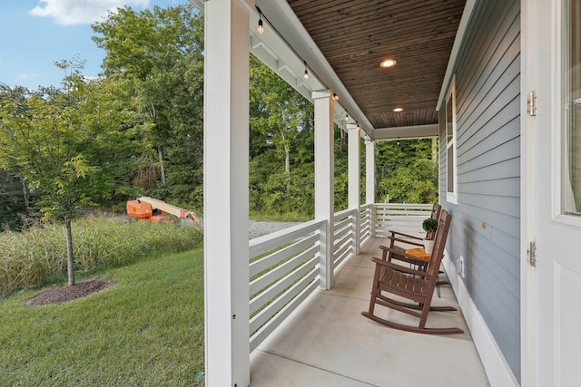 view of patio featuring a porch