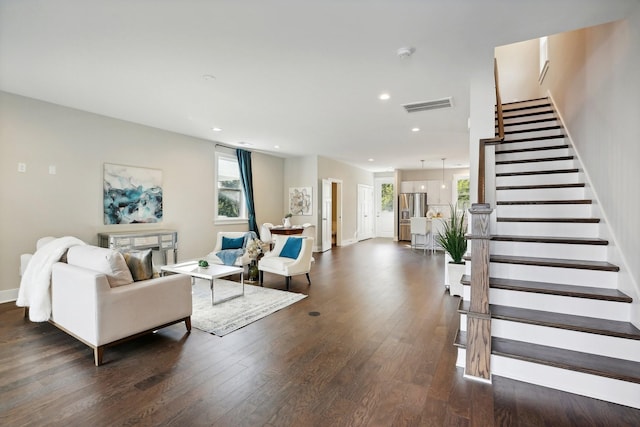 living room with dark wood-type flooring