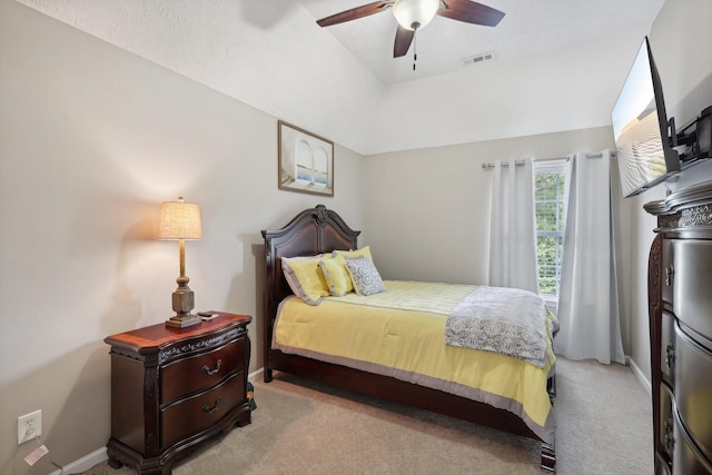 bedroom featuring ceiling fan and light colored carpet