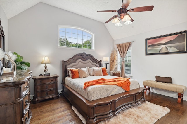 bedroom featuring a textured ceiling, dark wood-type flooring, ceiling fan, and lofted ceiling