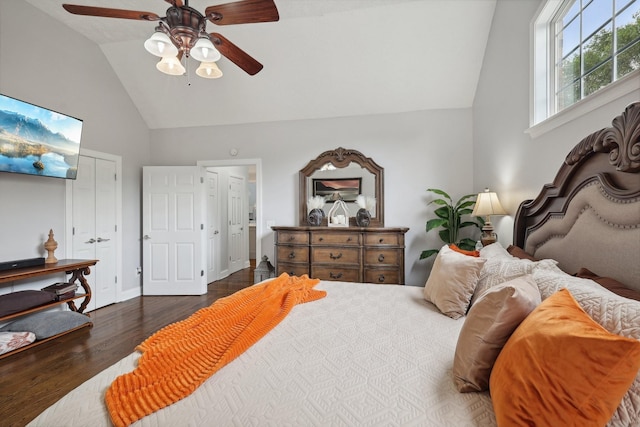 bedroom featuring vaulted ceiling, ceiling fan, and dark wood-type flooring