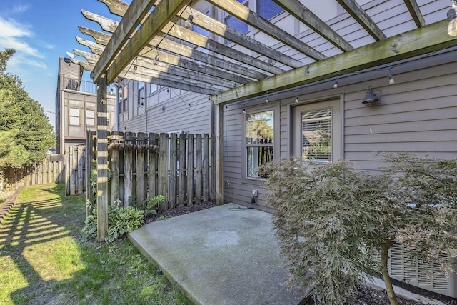 view of patio featuring a pergola