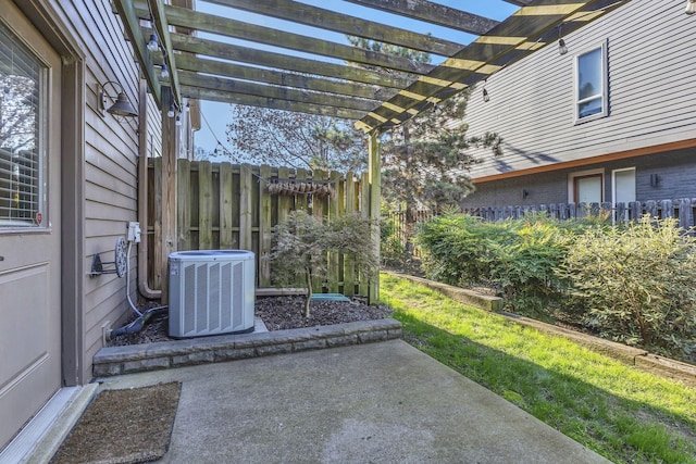 view of patio featuring a pergola and cooling unit