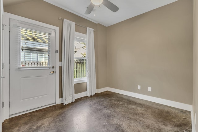 doorway with ceiling fan