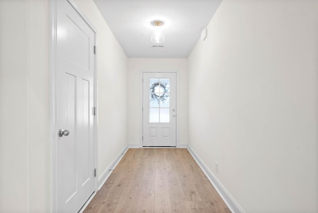 entryway with light hardwood / wood-style flooring