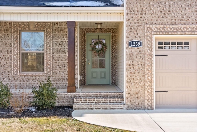 entrance to property with a garage