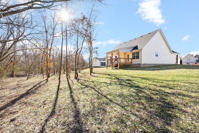 view of yard with a wooden deck