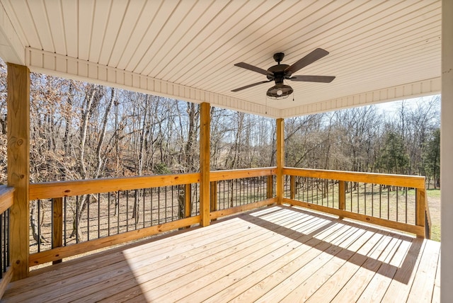 wooden terrace featuring ceiling fan